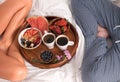 Lovely young couple having breakfast in bed Royalty Free Stock Photo