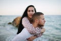 Lovely young couple hugging, background is beautiful sea view Royalty Free Stock Photo