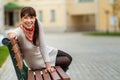 Lovely young girl relaxing on bench Royalty Free Stock Photo