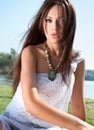 Lovely young girl relaxing on a meadow Royalty Free Stock Photo