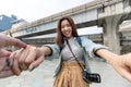 Lover Asian couple holding hands at Bangkok city , Thailand. Romantic and travel in summer vacation concept