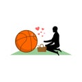 Lover Basketball. Guy and ball on picnic. Meal in nature. blanket and basket for food on lawn. Romantic date. Love sport play game