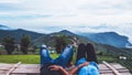 Lover Men and women Asia travel relax. Morning atmosphere nature Forests, mountains. Phu Thap Buek Thailand Royalty Free Stock Photo