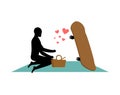 Lover skateboarding. Guy and Skateboard on picnic. Meal in nature. blanket and basket for food on lawn. Romantic date. Love