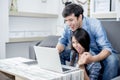 Lover are surprising when using the laptop. Family concept, Lovers concept, Technology concept Royalty Free Stock Photo