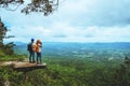 Lover woman and men Asian travel nature. Travel relax. Photography Cucumber sessilis flower field Royalty Free Stock Photo