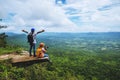 Lover woman and men Asian travel nature. Travel relax. Photography Cucumber sessilis flower field Royalty Free Stock Photo