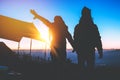 Lover women and men Asian travel nature. Travel relax. Natural Touch countryside. camping on the Mountain. watch the sun rise. In Royalty Free Stock Photo