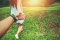 Lover women and men asians travel relax in the holiday. Hold hands running on the lawn. Wild nature wood on the mountain Royalty Free Stock Photo