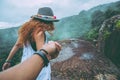 Lover women and men asians travel relax in the holiday. Hold hands running on the lawn. Wild nature wood on the mountain Royalty Free Stock Photo