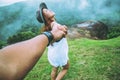 Lover women and men asians travel relax in the holiday. Hold hands running on the lawn. Wild nature wood on the mountain Royalty Free Stock Photo