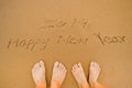 Lover Write 2019 happy new year on beach