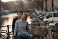 Lovers in Amsterdam at sunset Royalty Free Stock Photo
