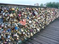 Lovers castles on the railing of the Pont des Arts bridge in Paris