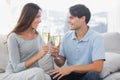 Lovers clinking their flutes of champagne Royalty Free Stock Photo