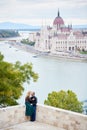 Lovers couple on background of Parliament Building in Budapest, Hungary Royalty Free Stock Photo