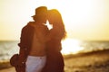 Lovers Couple in Love Embracing on the Date on the Beach. Royalty Free Stock Photo