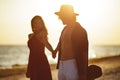 Lovers Couple in Love Walking on the Date on the Beach. Royalty Free Stock Photo