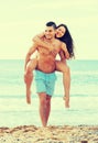 Lovers couple at sea shore Royalty Free Stock Photo