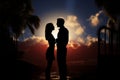 Lovers embrace, silhouetted against a sunset with palm trees