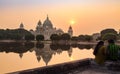 Lovers enjoy a romantic serene sunset at the Victoria Memorial Kolkata, India.