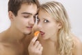 Lovers enjoying fruit breakfast Royalty Free Stock Photo