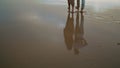 Lovers feet walking sand beach at sea vacation. Unrecognizable couple stepping