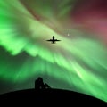 Lovers and flying aircraft in park at night