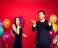 Lovers are happily celebrating on the red background,happy New Year,Merry Christmas Royalty Free Stock Photo