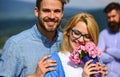 Lovers hugs outdoor flirt romance relations. Couple in love dating while jealous bearded man watching wife cheating him Royalty Free Stock Photo