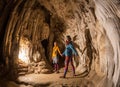 Lovers kissing in a cave underground Royalty Free Stock Photo