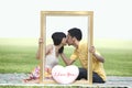 Lovers kissing in the park Royalty Free Stock Photo