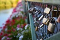 Lovers locks on the Kisses Bridge, in Comana, Romania. Royalty Free Stock Photo