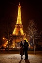 Lovers near the Eiffel tower night in Paris. travel at spring in France Royalty Free Stock Photo