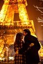 Lovers near the Eiffel tower night in Paris. travel at spring in France Royalty Free Stock Photo