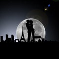 Lovers in paris night with moon Royalty Free Stock Photo