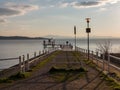Lovers on the pier at dusk Royalty Free Stock Photo