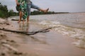 Couple play shore water splashes love clothes