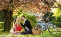 Lovers sensual kissing. My treasure. Romantic proposal. Enjoying their perfect date. Couple relaxing in park with