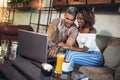 Lovers spending time in cafe watching media on laptop Royalty Free Stock Photo