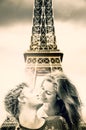 Lovers under the Eiffel Tower in Paris