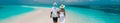 Lovers walk along the beach in the Maldives. Selective focus.