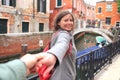 Lovers walking on Venice streets. Happy romantic vacation in Italy. Couple enjoying in Venice Royalty Free Stock Photo