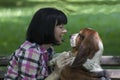 She loves dogs. Woman with a dog enjoying the beautiful day in n