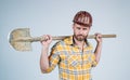 He loves his job. mature builder in shirt. unshaven man on construction site. handsome building worker in hard hat Royalty Free Stock Photo