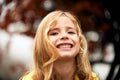 She loves the outdoors. a cute little girl playing outside on an Autumn day. Royalty Free Stock Photo