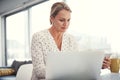 She loves to work from home. a mature businesswoman working from her home office. Royalty Free Stock Photo