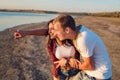 Lovestory of couple on the beach On the Sunset Royalty Free Stock Photo