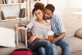 Loving Afro Couple With Passports And Tickets