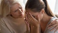 Loving aged mom comfort grownup depressed daughter